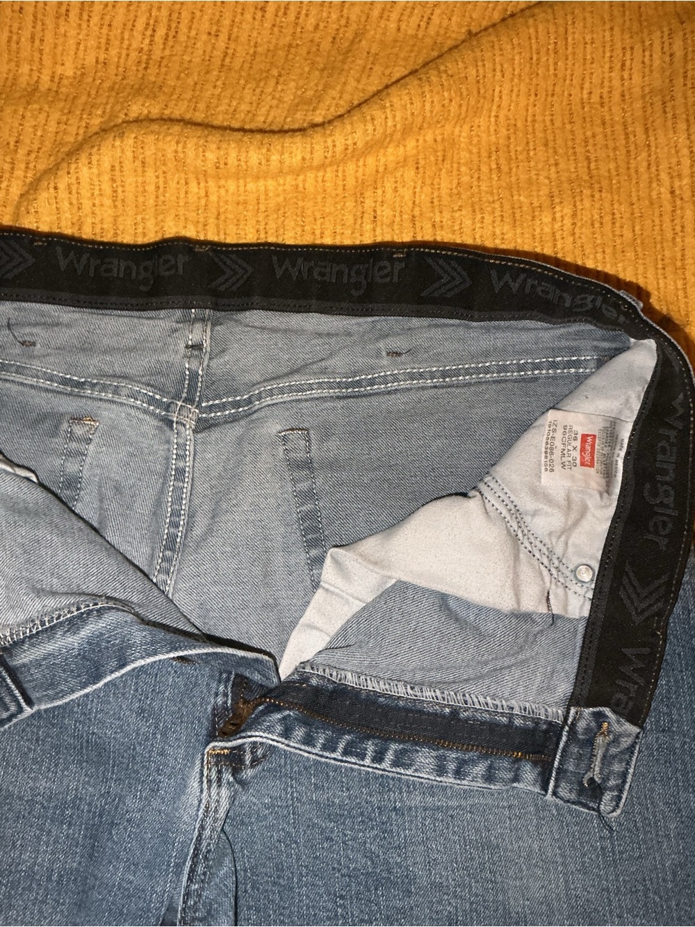 Wrangler Light Blue Denim Jeans with Black Branded Waistband